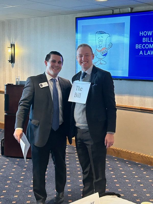 Garet King, Fusion Bank, Overland Park, (right) demonstrated how a bill becomes a law in an exercise facilitated by KBA’s SVP Government Relations, Alex Orel.