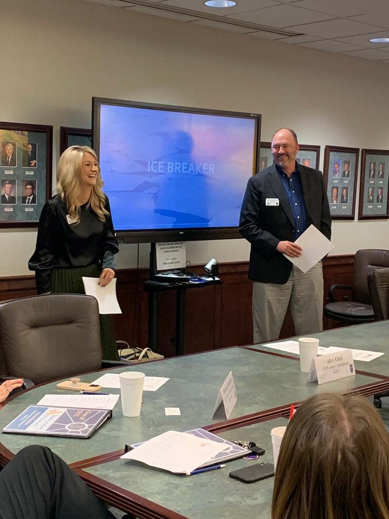 Kelsey Burdiek, United Bank & Trust, Seneca, (left) and James Leftwich, Security 1st Title, Wichita, share a laugh as the class breaks the ice.