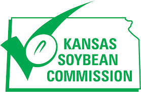 Green logo of the Kansas Soybean Commission featuring a soybean within a checkmark shape, outlined by the state of Kansas, conveying agriculture focus.